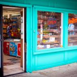 blue and brown store with blue wooden door
