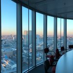 people sitting on chair near glass window during daytime