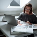 Focused Designer at her Workspace