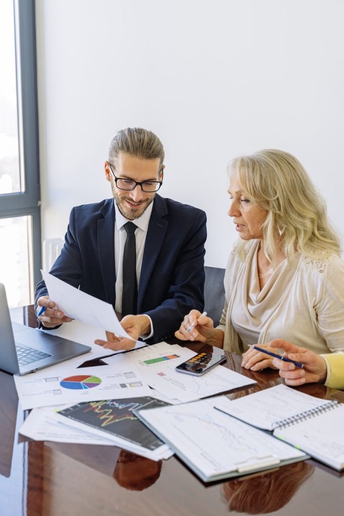 A Man and a Woman Discussing a Document