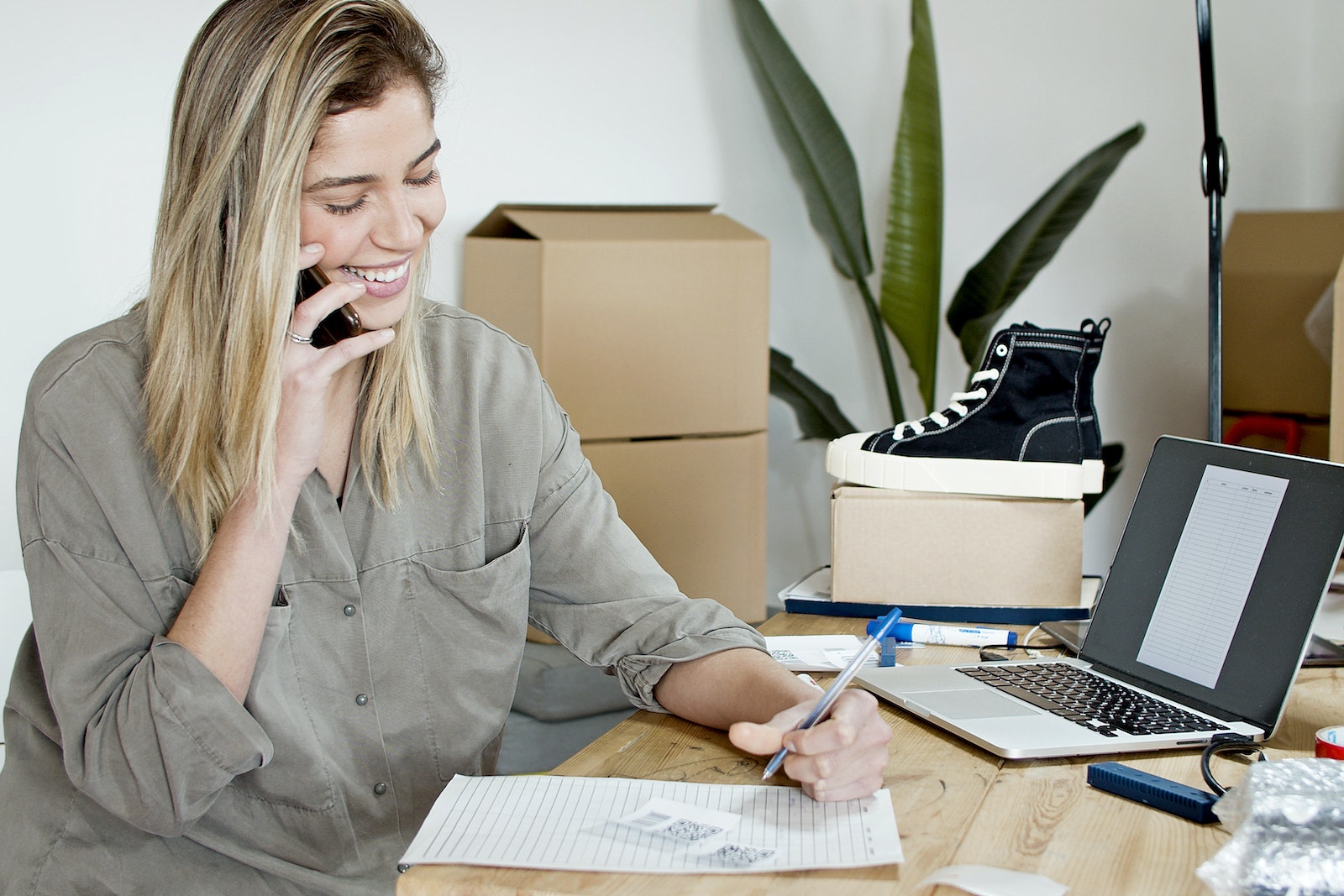 Woman Taking Orders by Phone